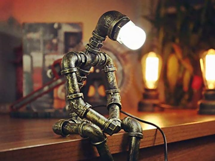 With its clever blend of retro-futuristic style and practicality, the EFAYCRR Steampunk Industrial Sitting Robot Lamp is a captivating addition to any steampunk enthusiast’s collection.