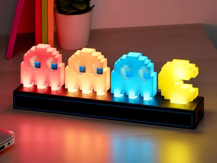 The Paladone Pac Man and Ghosts Light compact and colorful light features Pac-Man and three ghosts, adding a charming retro touch to any space.