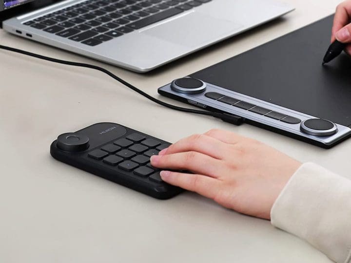 The HUION Mini Keydial Programmable Keypad is a compact and versatile peripheral designed to enhance productivity for digital artists, designers, and other creative professionals.