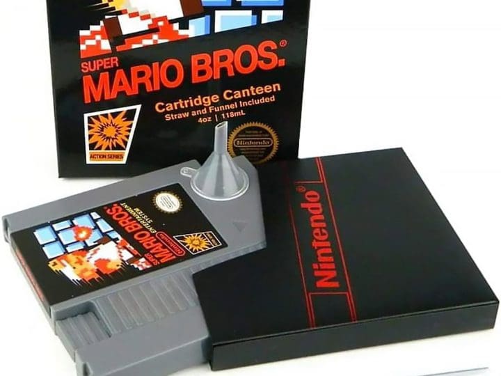 The Nintendo Super Mario Bros NES Cartridge Flask is a delightful novelty item that combines retro gaming nostalgia with a clever drinking accessory.